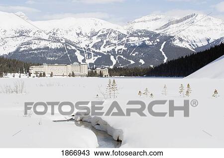 Banff National Park, Alberta, Canada; Chateau Lake Louise And A Ski Hill In Winter View Large Photo Image Stock Image - Banff National Park, Alberta, Canada; Chateau Lake Louise And A Ski Hill In Winter. Fotosearch