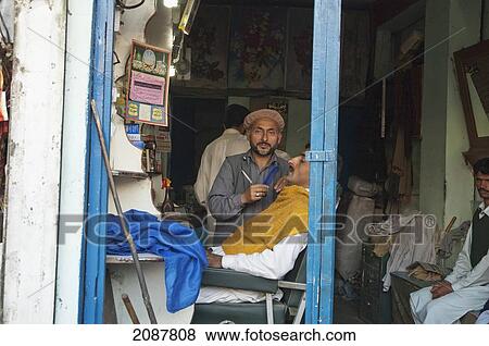 Barber Working In A Damaged Building By The 8 October 2005 Earthquake, Muzaffarabad, Azad Kashmir, Pakistan View Large Photo Image Stock Photo - Barber Working In A Damaged Building By The 8 October 2005 Earthquake, Muzaffarabad, Azad Kashmir, Pakistan. Fotosearch