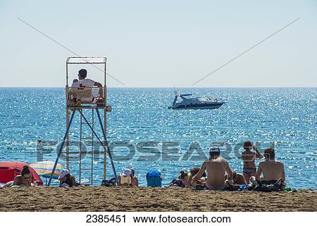 Stock Image - Barceloneta beach; Barcelona, Catalonia, Spain. Fotosearch
