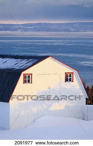 Stock Photo - Barn And Saint Lawrence River In Winter; Saint-Irenee Quebec Canada. Fotosearch