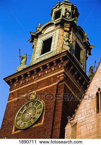 Stock Image - Baroque Spire And Clock On Krakow Cathedral. Fotosearch