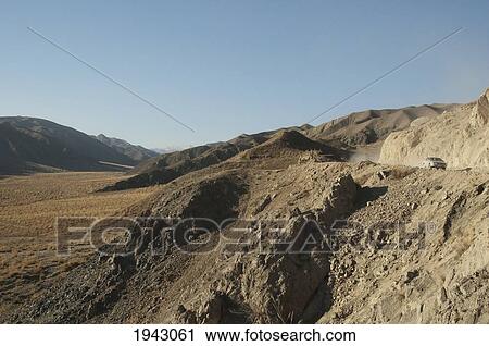 Stock Image - Barren Landscape Along The Kabul To Sarobi Road, Kabul Province, Afghanistan. Fotosearch