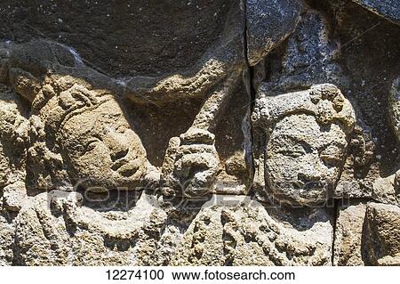 Bas-relief depicting the life of Buddha on a gallery of Candi Borobudur, Borobudur Temple Compounds, Central Java, Indonesia View Large Photo Image Stock Image - Bas-relief depicting the life of Buddha on a gallery of Candi Borobudur, Borobudur Temple Compounds, Central Java, Indonesia. Fotosearch