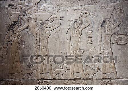 Bas-Relief Of A Procession Of People Carrying Offerings In The Tomb Of Mereruka, Saqqara, Al Jizah, Egypt View Large Photo Image Stock Image - Bas-Relief Of A Procession Of People Carrying Offerings In The Tomb Of Mereruka, Saqqara, Al Jizah, Egypt. Fotosearch