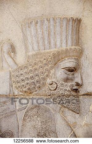 Bas relief of Persian guard, Gateway into Hall of 100 Columns; Persepolis, Iran View Large Photo Image Stock Photo - Bas relief of Persian guard, Gateway into Hall of 100 Columns; Persepolis, Iran. Fotosearch