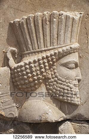 Bas relief of Persian guard, Gateway into Hall of 100 Columns; Persepolis, Iran View Large Photo Image Stock Photo - Bas relief of Persian guard, Gateway into Hall of 100 Columns; Persepolis, Iran. Fotosearch