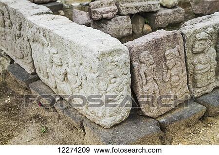 Stock Photo - Bas-reliefs at Candi Cetho, a Javanese-Hindu temple located on the western slope of Mount Lawu, Central Java, Indonesia. Fotosearch