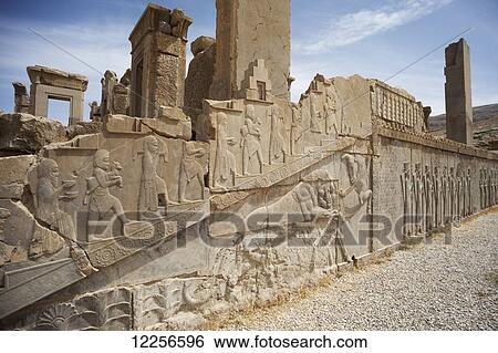 Bas reliefs of servants, Winter Palace of Darius (Tashara); Persepolis, Iran View Large Photo Image Stock Photograph - Bas reliefs of servants, Winter Palace of Darius (Tashara); Persepolis, Iran. Fotosearch
