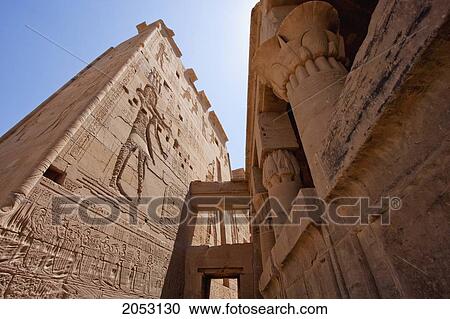 Bas-Reliefs On Eastern Tower Of The Second Pylon Of The Temple Of Isis, Philae, Aswan, Egypt View Large Photo Image Stock Image - Bas-Reliefs On Eastern Tower Of The Second Pylon Of The Temple Of Isis, Philae, Aswan, Egypt. Fotosearch