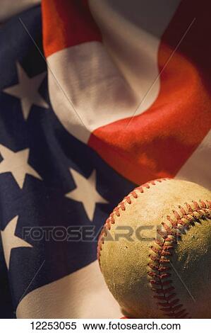 Baseball on an American flag View Large Photo Image Stock Photography - Baseball on an American flag. Fotosearch