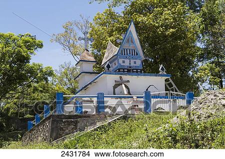 Picture - Batak tugu (Bone house) on Samosir Island, Lake Toba, North Sumatra, Indonesia. Fotosearch