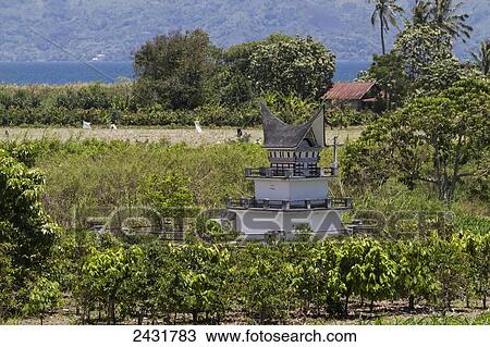 Stock Image - Batak tugu (Bone house) on Samosir Island, Lake Toba, North Sumatra, Indonesia. Fotosearch