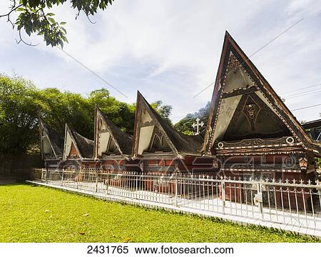 Stock Photography - Batak tugu (Bone houses) at Huta Bolon Museum in Simanindo village on Samosir Island, Lake Toba, North Sumatra, Indonesia. Fotosearch