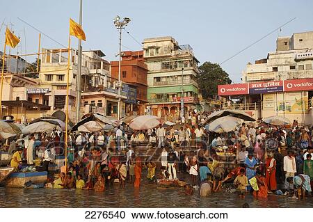 Stock Image - Bathing ghats on the River Ganges; Varanasi, India. Fotosearch