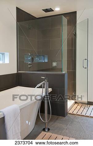 Picture - Bathtub And Shower Stall In Contemporary Bathroom; Victoria, Vancouver Island, British Columbia, Canada. Fotosearch