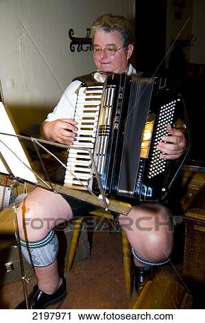 Stock Image - Bavarian Band, At Hofbrau House, Munich's Most Famous Beer Hall Munich, Germany. Fotosearch