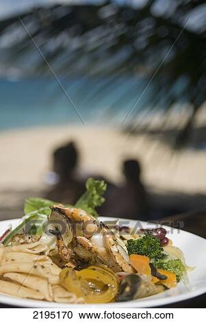 BBQ'd prawns with salad, The Aquarium Restaurant, Point Salines Beach, Grenada. View Large Photo Image Stock Image - BBQ'd prawns with salad, The Aquarium Restaurant, Point Salines Beach, Grenada.. Fotosearch