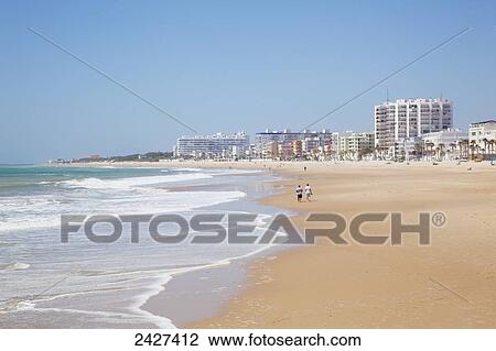 Beach and buildings on the waterfront; Rota, Andalusia, Spain View Large Photo Image Stock Image - Beach and buildings on the waterfront; Rota, Andalusia, Spain. Fotosearch