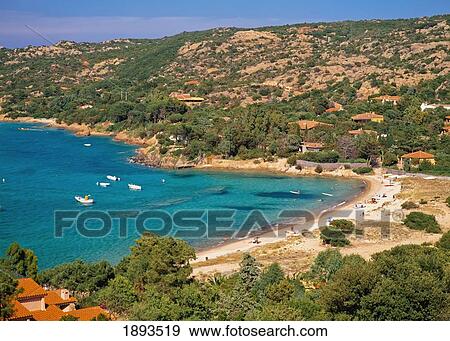 Stock Photo - Beach And Surrounding Hills, Elevated View. Fotosearch