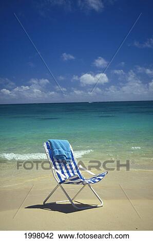 Beach Chair Along Shoreline Waters, Beautiful White Sands, Clear Turquoise Waters View Large Photo Image Stock Image - Beach Chair Along Shoreline Waters, Beautiful White Sands, Clear Turquoise Waters. Fotosearch