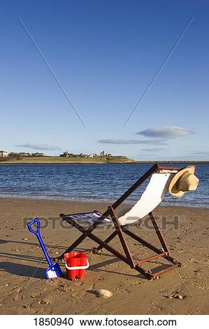 Beach Chair And Personal Items On Beach View Large Photo Image Stock Image - Beach Chair And Personal Items On Beach. Fotosearch
