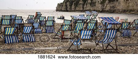 Picture - Beach Chairs On The Beach; Beer, Devon, England. Fotosearch