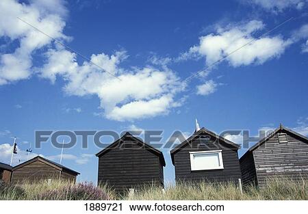 Stock Image - Beach Huts At Studland Bay. Fotosearch