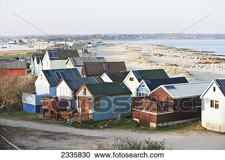 Beach Huts; Christchurch Harbour, Mudeford, Dorset, England, United Kingdom View Large Photo Image Stock Image - Beach Huts; Christchurch Harbour, Mudeford, Dorset, England, United Kingdom. Fotosearch