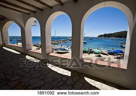 Beach In Calella Fishing Village From Under Arches View Large Photo Image Stock Image - Beach In Calella Fishing Village From Under Arches. Fotosearch