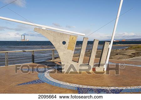 Picture - Beach Sculpture With The Strait Of Magellan In Background; Punta Arenas Chile. Fotosearch
