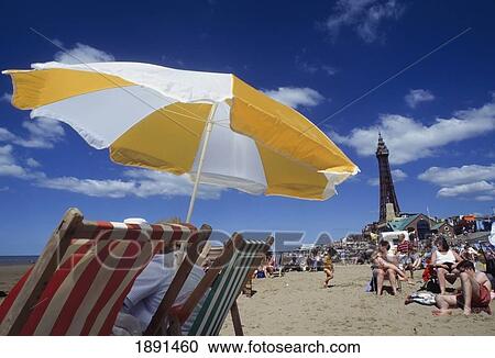 Beach With Umbrella And Deck Chairs View Large Photo Image Stock Image - Beach With Umbrella And Deck Chairs. Fotosearch