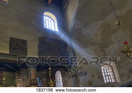 Stock Photo - Beam Of Light From Window In Church Of The Nativity; Bethlehem, Jerusalem, Israel. Fotosearch