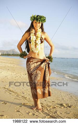 Stock Image - Beautiful Hawaiian Hula Girl On A Tropical Beach.. Fotosearch
