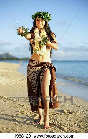 Beautiful Hawaiian Hula Girl On A Tropical Beach. View Large Photo Image Stock Photo - Beautiful Hawaiian Hula Girl On A Tropical Beach.. Fotosearch