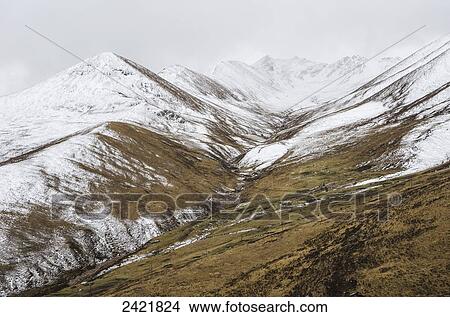 Beautiful snowy Tibetan high mountain landscape; Qinghai province, Tibet View Large Photo Image Picture - Beautiful snowy Tibetan high mountain landscape; Qinghai province, Tibet. Fotosearch