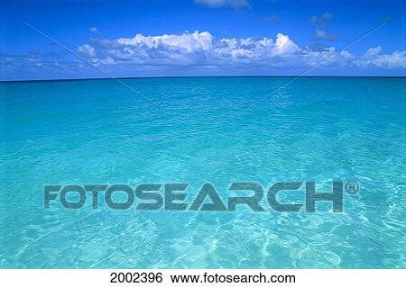 Beautiful Turquoise Water, Calm And Clear To Horizon, Clouds In Blue Sky View Large Photo Image Stock Photograph - Beautiful Turquoise Water, Calm And Clear To Horizon, Clouds In Blue Sky. Fotosearch
