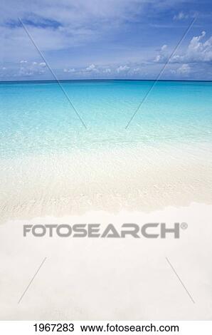Stock Image - Beautiful White Sand Beach Seascape.. Fotosearch