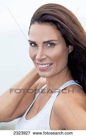 Beauty Portrait Of A Woman In Exercise Clothing View Large Photo Image Stock Photo - Beauty Portrait Of A Woman In Exercise Clothing. Fotosearch