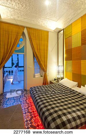 Bedroom and verandah of Presidential Suite in Casa Colombo Hotel; Colombo, Sri Lanka View Large Photo Image Stock Photo - Bedroom and verandah of Presidential Suite in Casa Colombo Hotel; Colombo, Sri Lanka. Fotosearch