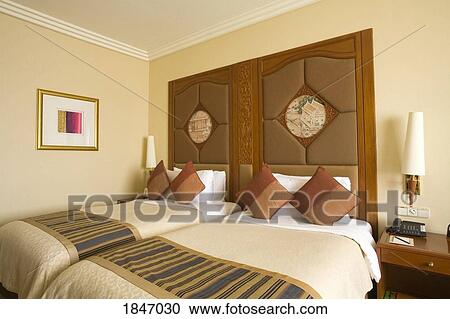 Stock Image - Bedroom In Shangri-La Hotel; Bangkok, Thailand. Fotosearch