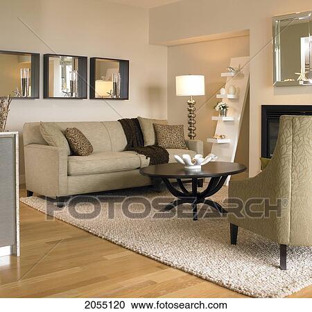 Stock Image - Beige Living Room With Black Coffee Table, Victoria, British Columbia. Fotosearch