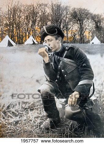 Stock Photo - Belgian Artillery Man Using A Field Telephone During The First World War. From La Esfera, 1914.. Fotosearch