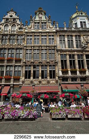 Belgium, People eating and drinking in outside cafes in Grand Place; Brussels View Large Photo Image Stock Photography - Belgium, People eating and drinking in outside cafes in Grand Place; Brussels. Fotosearch