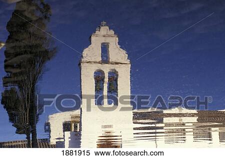 Stock Photography - Bell Tower On Pontikonissi As Reflected In Ocean, Close Up. Fotosearch