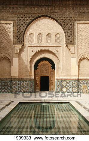 Stock Image - Ben Youssef Medersa Courtyard With Pond, Marrakech (Marrakesh), Morocco. Fotosearch