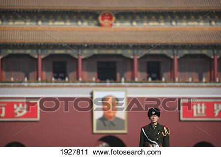 Beneath The Portrait Of Chairman Mao Zedong Chinese Soldiers Keep Guard Outside The Forbidden City Tiananmen Square Beijing China Stock Image Fotosearch