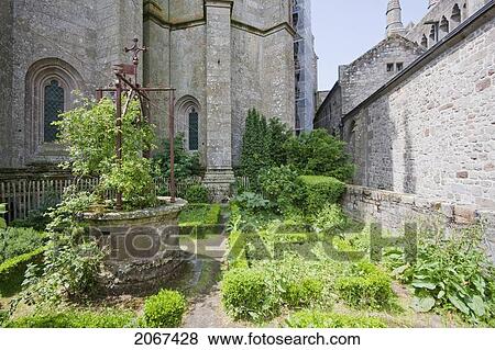 Benedictine Garden In The Abbey Of Mont-Saint-Michel, France View Large Photo Image Stock Photo - Benedictine Garden In The Abbey Of Mont-Saint-Michel, France. Fotosearch