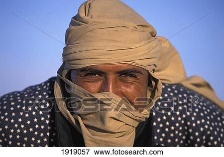 Berber Camel Driver; Douz, Tunisia View Large Photo Image Stock Photo - Berber Camel Driver; Douz, Tunisia. Fotosearch
