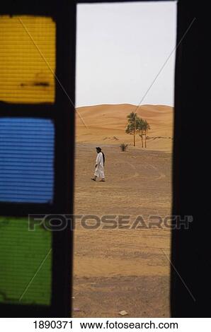 Berber Man Walking On Desert View Large Photo Image Stock Image - Berber Man Walking On Desert. Fotosearch