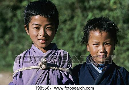 Bhutan, Portrait Of Two Young Bhutanese Children. View Large Photo Image Stock Photo - Bhutan, Portrait Of Two Young Bhutanese Children.. Fotosearch